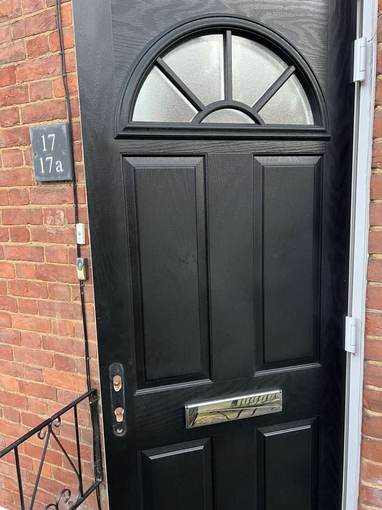 door mechanism repair on a wooden door